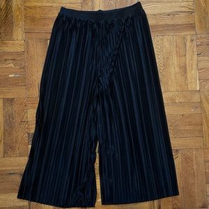 Black pleaded shiny sateen wide leg pants, never worn